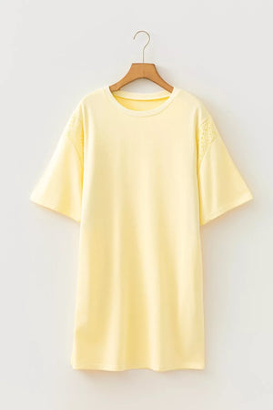 Yellow t-shirt with eyelet detail on sleeves and crew neck