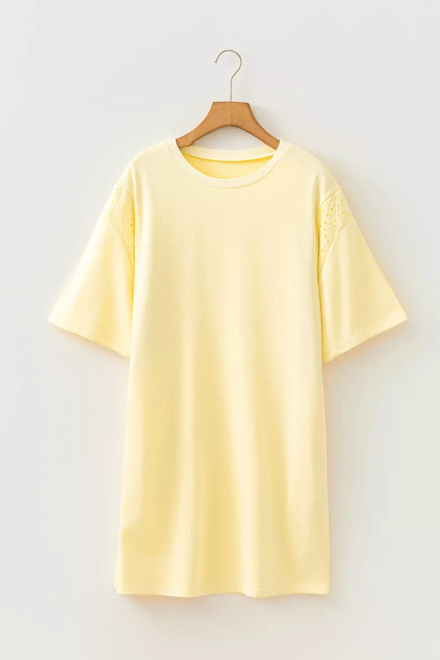 Yellow t-shirt with eyelet detail on sleeves and crew neck