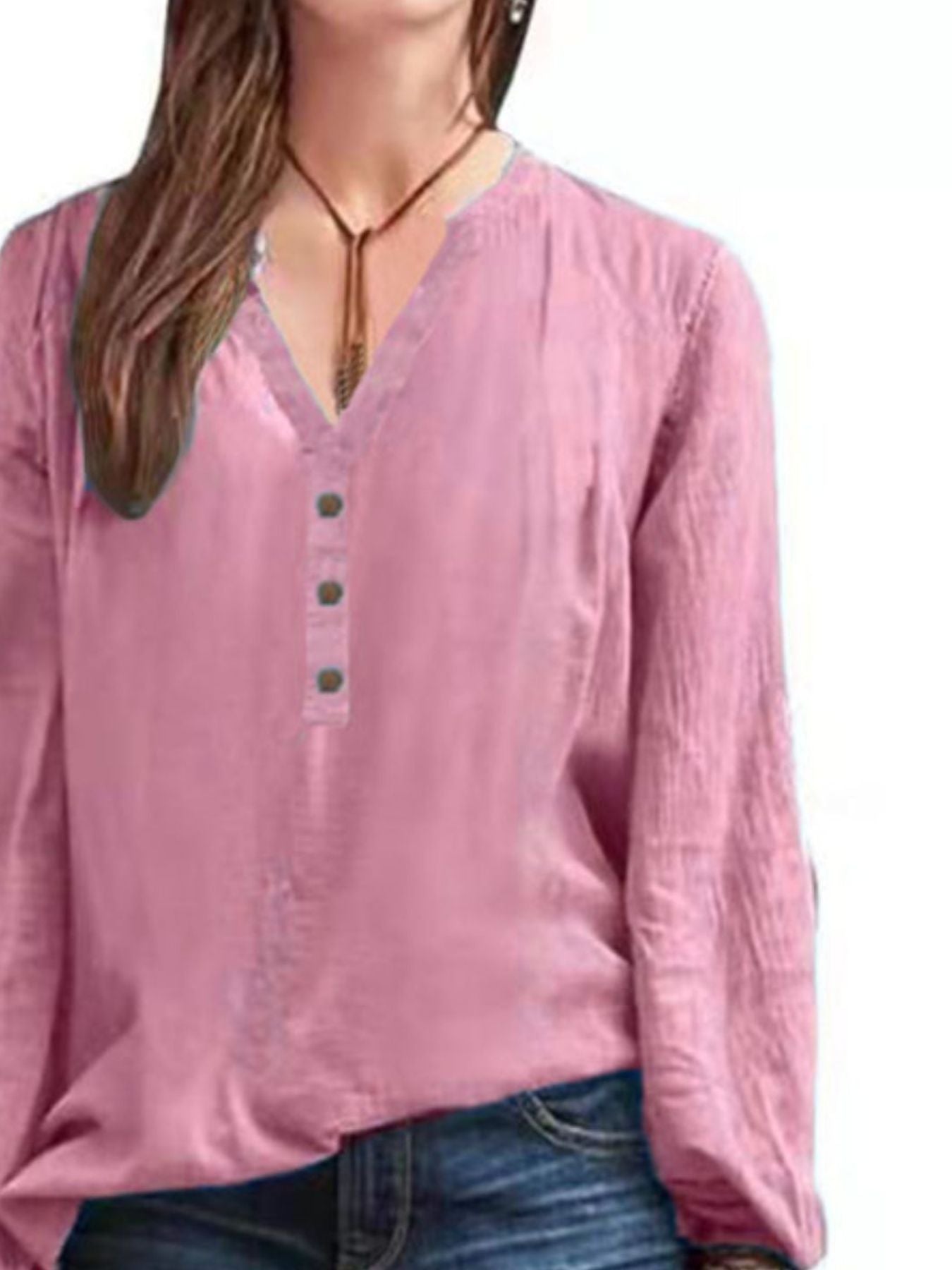 Pink long-sleeve blouse with notched neckline and button detail
