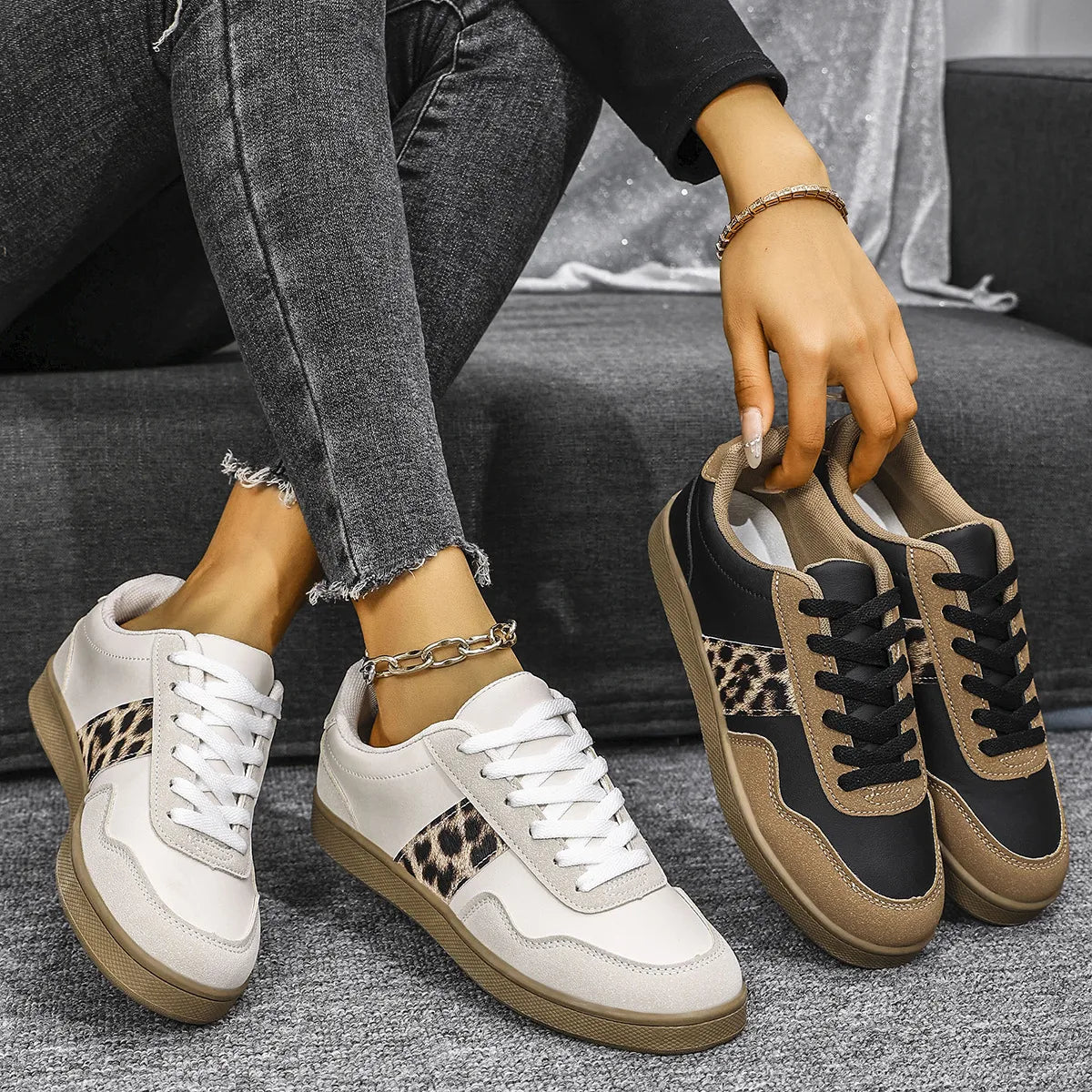Leopard panel retro sneakers in white and taupe with lace-up closure and contrast soles.