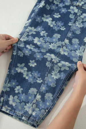 Floral drawstring barrel jeans in blue denim with pockets, featuring a cropped length and daisy pattern.