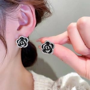 Black rose stud earrings with crystal halo detail