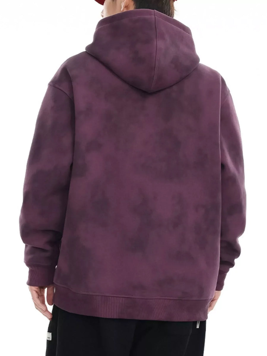 Oversized tie-dye hoodie in Berry Purple with a drawstring hood and ribbed cuffs.