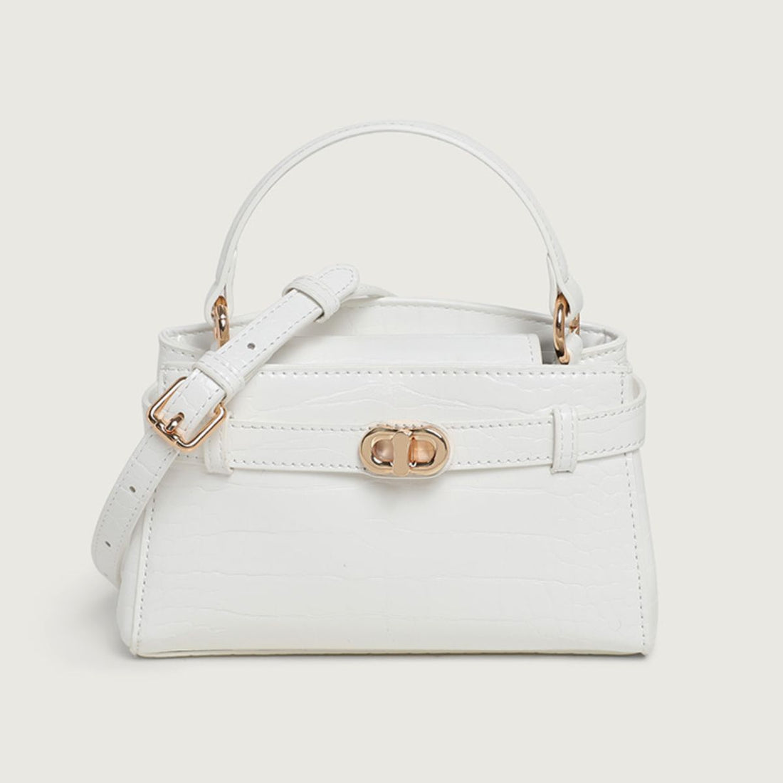 crossbody bag in Pink with crocodile-embossed and crocodile-embossed