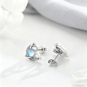 iridescent white earrings featuring moonstone inlay and celestial motif