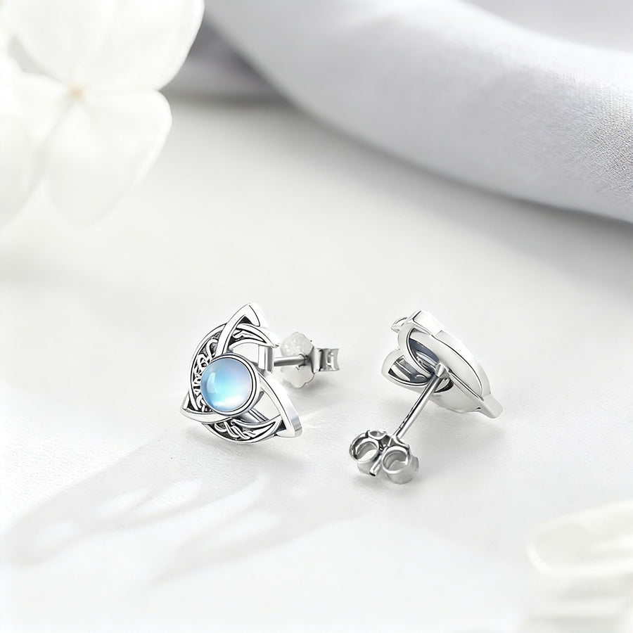 iridescent white earrings featuring moonstone inlay and celestial motif