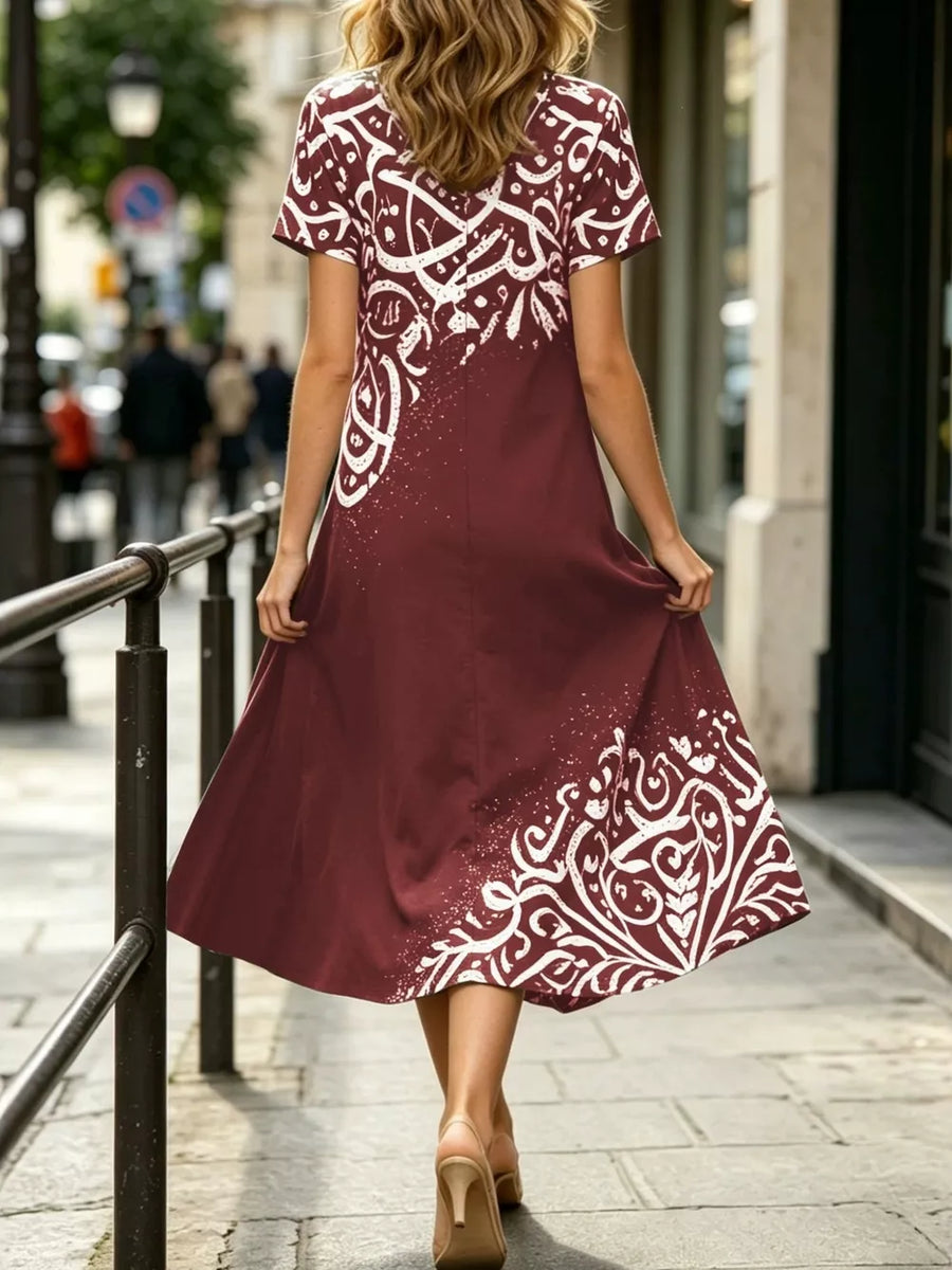 midi dress in navy blue with abstract-script and slit