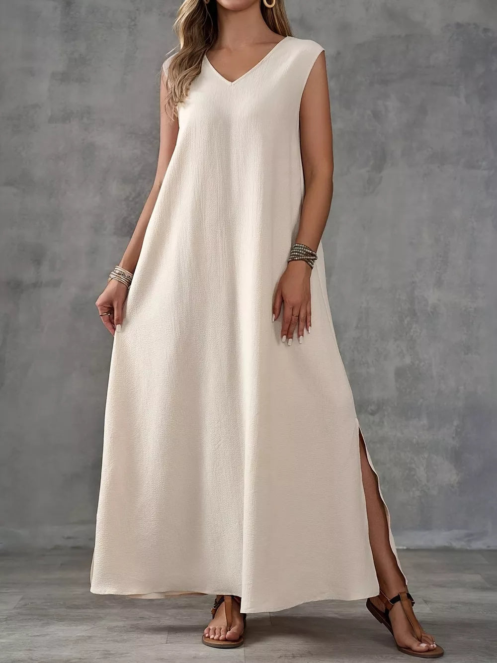 100% polyester Care instructions: Machine wash cold maxi dress in White with loose silhouette