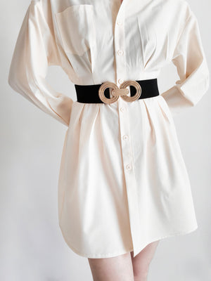 Black stretch belt with interlocking gold alloy circles buckle