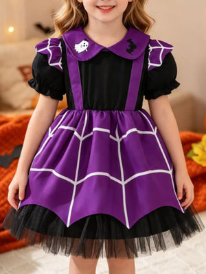 black dress with spiderweb and peter pan collar