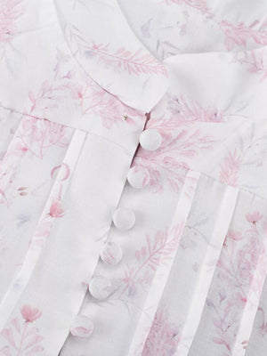 White floral print blouse with button front and pintuck details