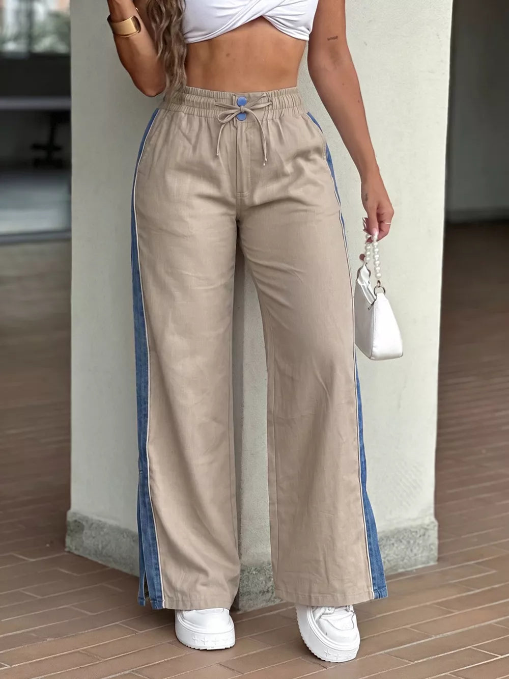 wide-leg pants in tan featuring drawstring waist and wide-leg fit