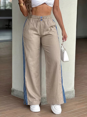 wide-leg pants in tan featuring drawstring waist and wide-leg fit