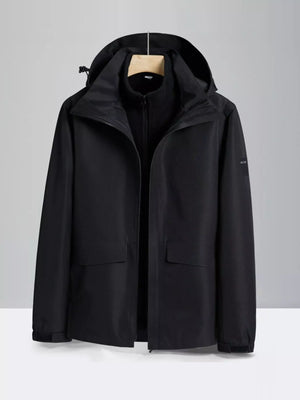 Black hooded waterproof jacket with zip front and two flap pockets.