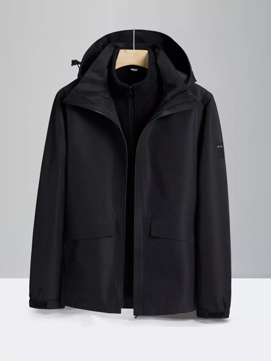 Black hooded waterproof jacket with zip front and two flap pockets.