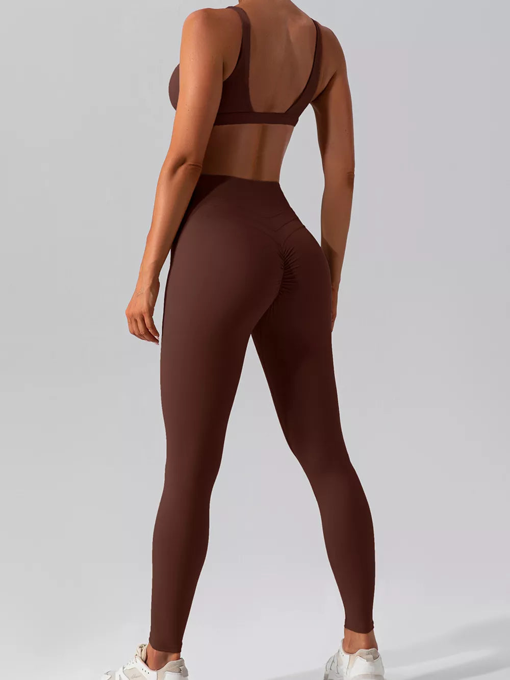 75% nylon, 25% spandex Care instructions: Machine wash cold active set in Creamy-white with fitted silhouette