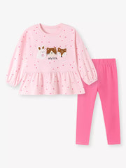 hot pink peplum top featuring tiered and polka dot