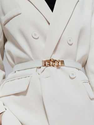 White faux leather belt with gold chain detail and buckle