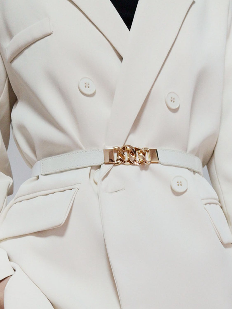 White faux leather belt with gold chain detail and buckle