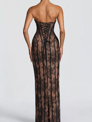 Black lace-up maxi dress with sweetheart neckline and lace overlay.