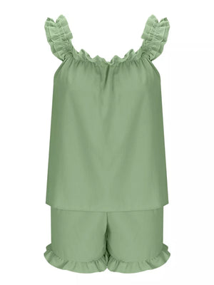Light blue ruffled pajama set with elastic neckline and ruffle trim shorts.