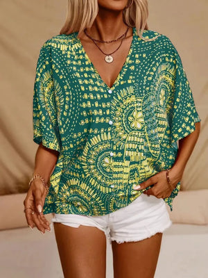 Green bohemian print v-neck t-shirt with short sleeves and button front.