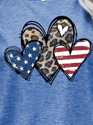 Cobalt blue t-shirt with three hearts graphic: American flag, leopard print, and red stripes.