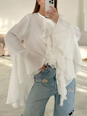 White ruffled flounce sleeve blouse with buttoned front and airy fabric.