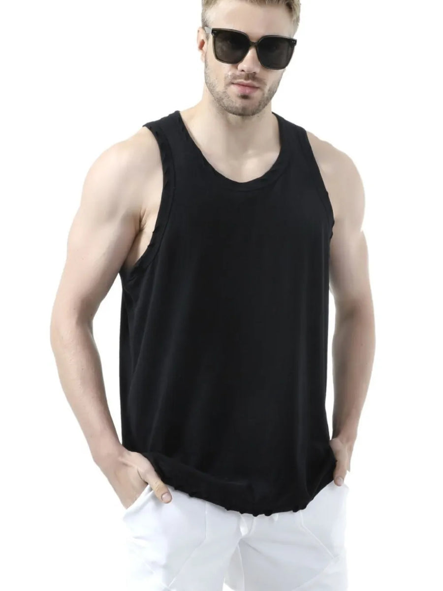 Black relaxed fit tank top with raw edge detail and scoop neck.
