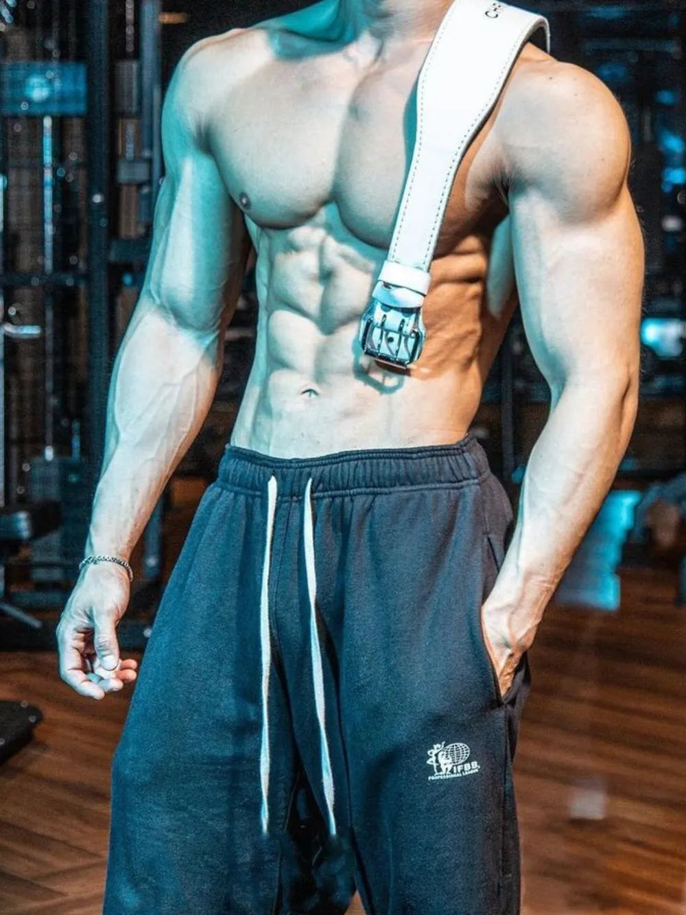 Black jogger shorts with white drawstrings and a small logo detail.