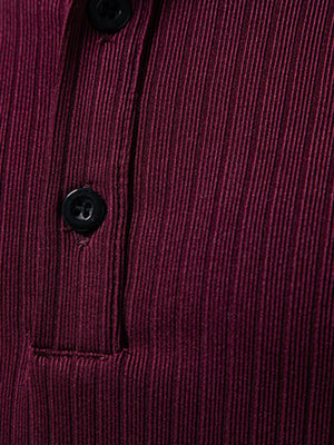 Burgundy ribbed henley t-shirt with black buttons and visible stitching detail.