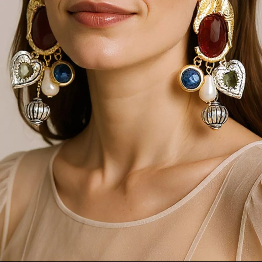 earrings in gold featuring dangle and dangle fit