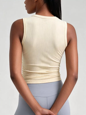 100% polyester Care instructions: Machine wash cold athletic tank in Dusty Pink with fitted silhouette