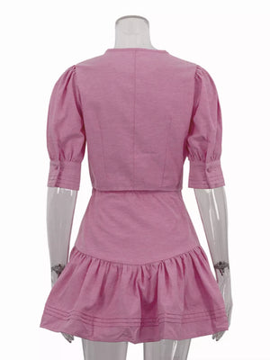 Pink puff sleeve crop top and ruffled mini skirt set with button cuffs