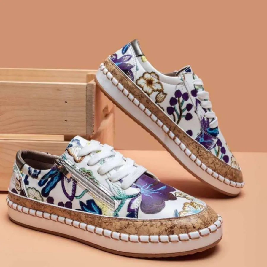 White floral zip-up sneakers with cork sole detail