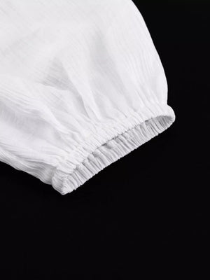 White crinkled fabric sleeve with elastic cuff