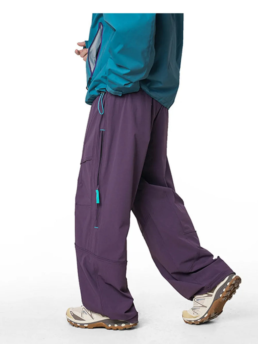 Relaxed Meadow Purple cargo active pants with drawstring and zip pockets.