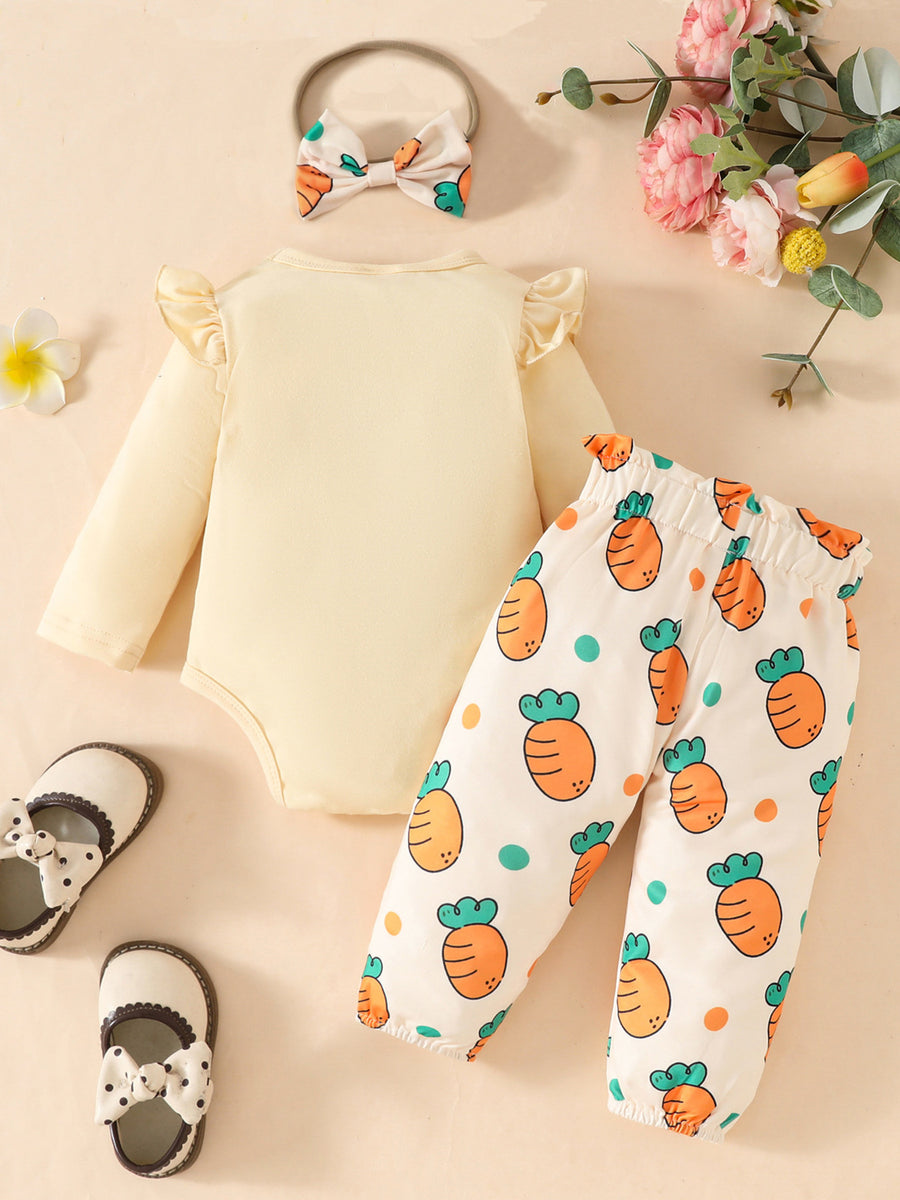Baby girl's yellow long sleeve bodysuit with ruffled sleeves and carrot print pants.