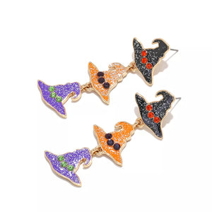 earrings in orange with graphic and drop earrings