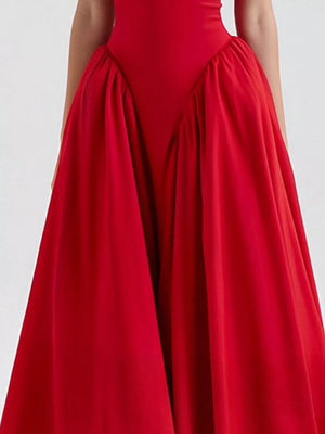 Elegant halter neck midi dress in deep red with voluminous gathered skirt and pockets.