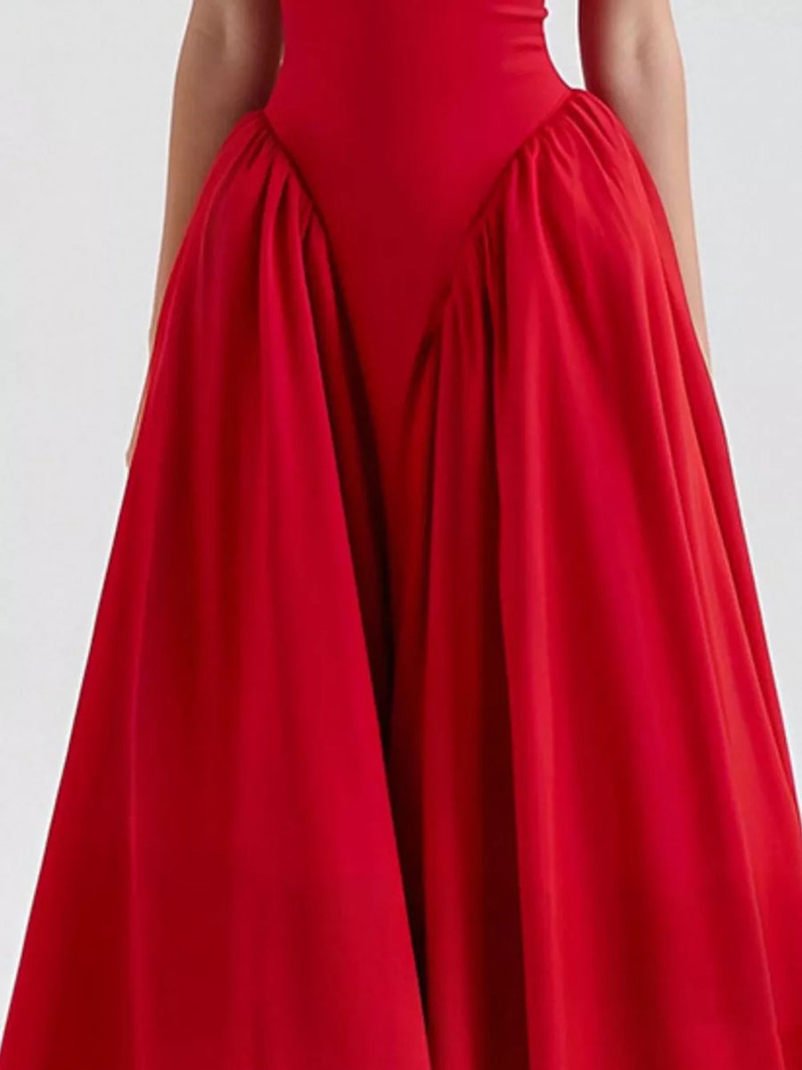 Elegant halter neck midi dress in deep red with voluminous gathered skirt and pockets.