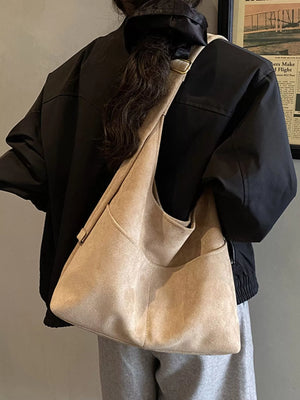 Large Khaki Suede Shoulder Bag with exterior pockets and adjustable strap.