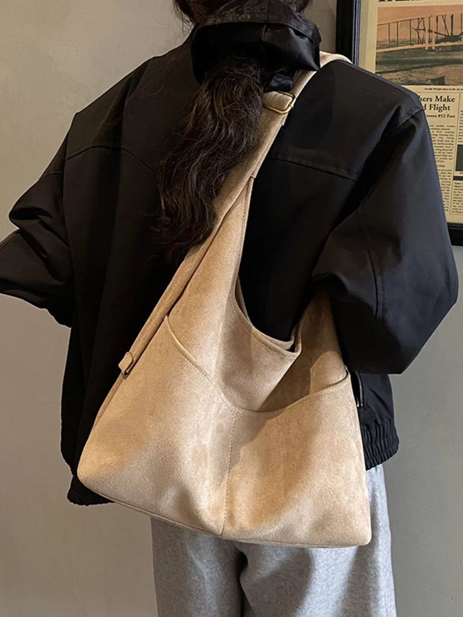 Large Khaki Suede Shoulder Bag with exterior pockets and adjustable strap.