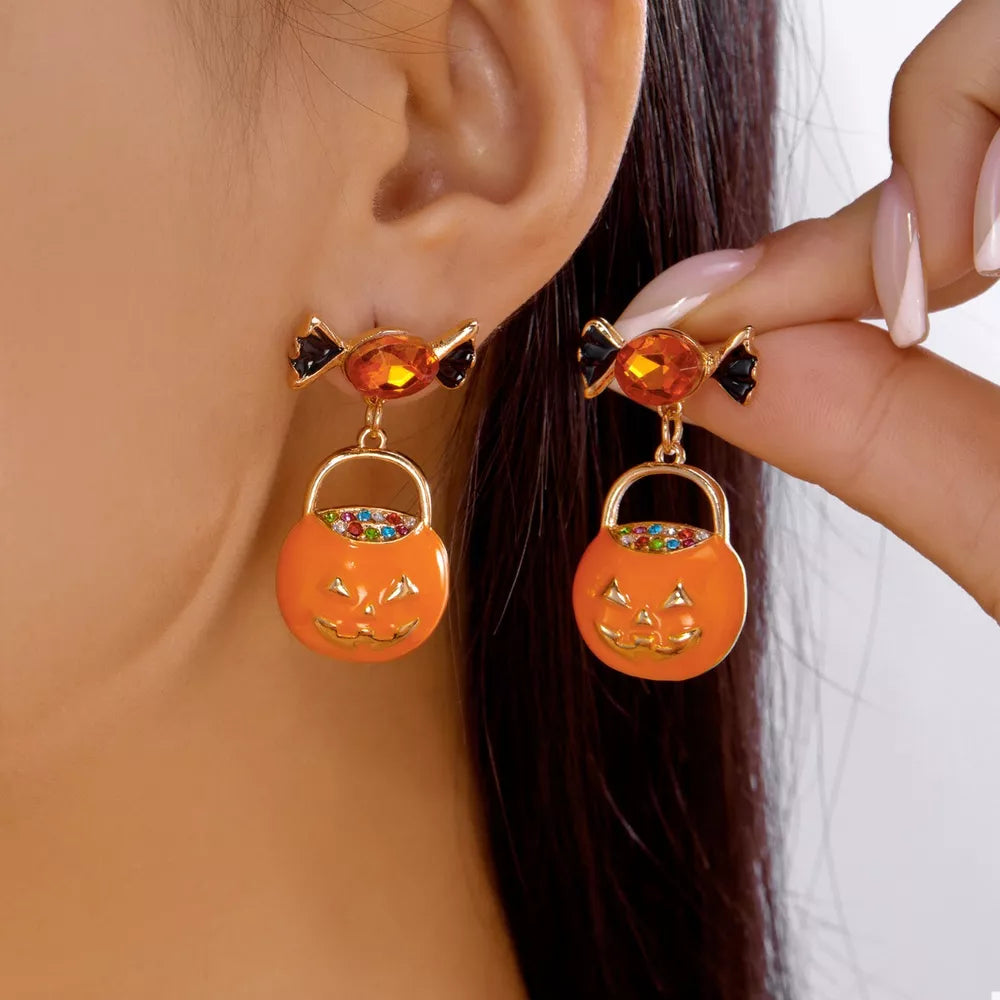 earrings in orange featuring rhinestone embellishment and dangle fit