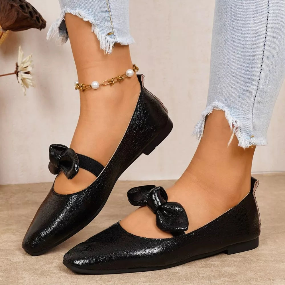 Black square toe slip-on flats with bow detail and elastic strap