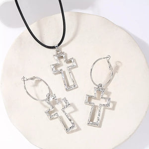 Silver cross pendant necklace and hoop earrings set with textured detail