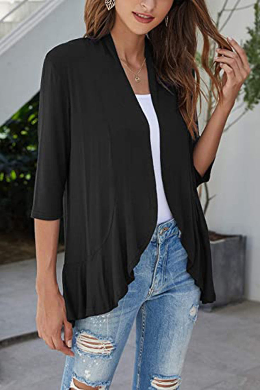 Black waterfall cardigan with asymmetric hemline and 3/4 sleeves.