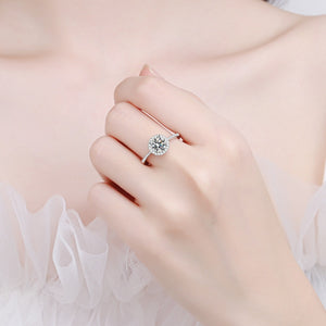 ring in silver featuring halo setting and fitted fit