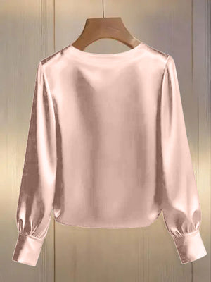 Pearl trim round neck pink satin blouse with long sleeves and button cuffs