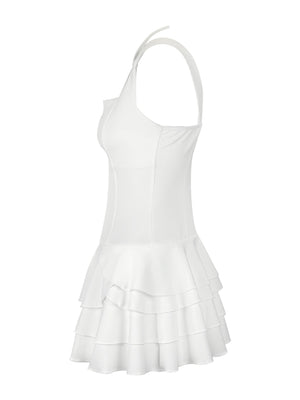 White mini dress with fitted bodice and tiered ruffled hem